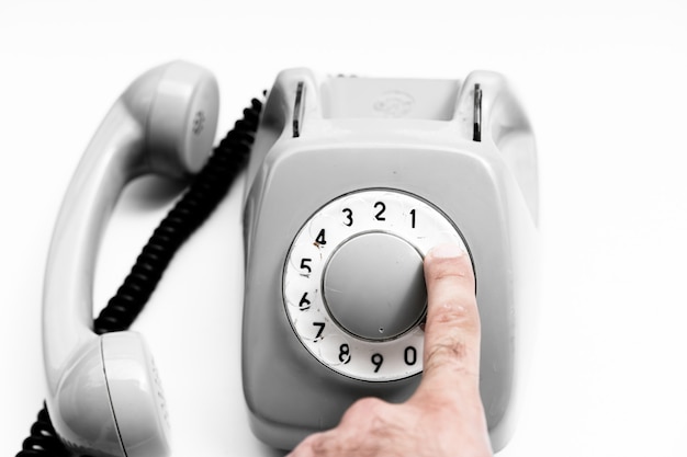 Dialing a rotary dial phone number