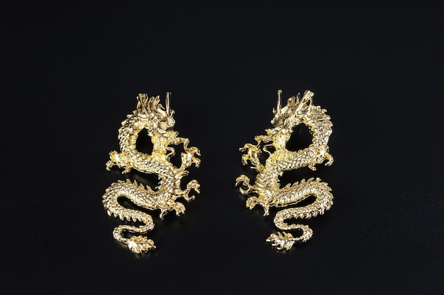 Diamond earrings jewelry luxury silver and gold earrings with diamonds sapphires in black background