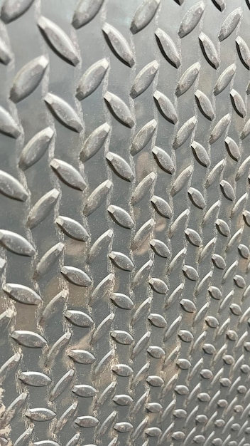 Металлический фон с алмазной пластиной Черный металлический фон из стальной пластины или нержавеющая текстура Структура стальной алмазной пластины