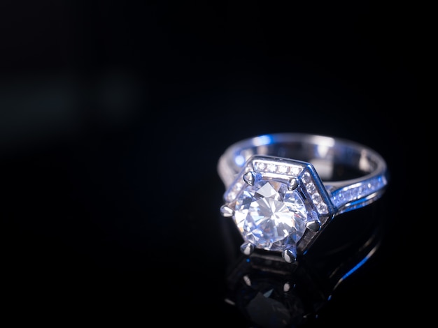 Photo diamond ring on black table