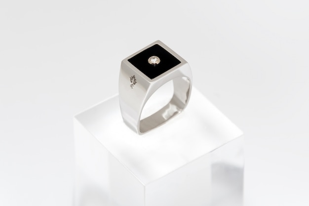 Diamond ring for men. White golden male ring on white