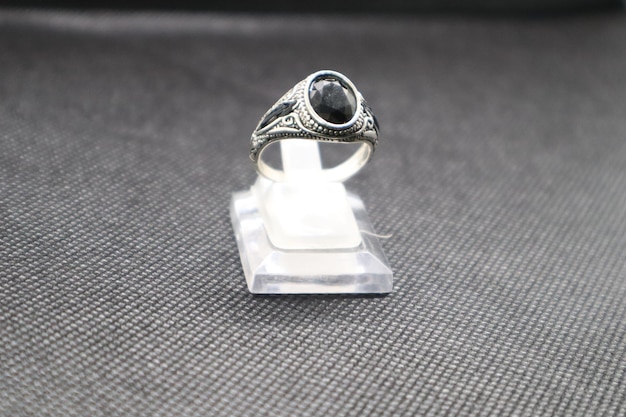 a diamond ring with a stone in the middle