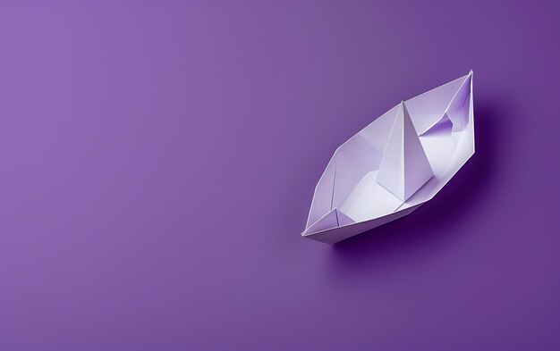 Photo a diamond shaped object is on a purple background