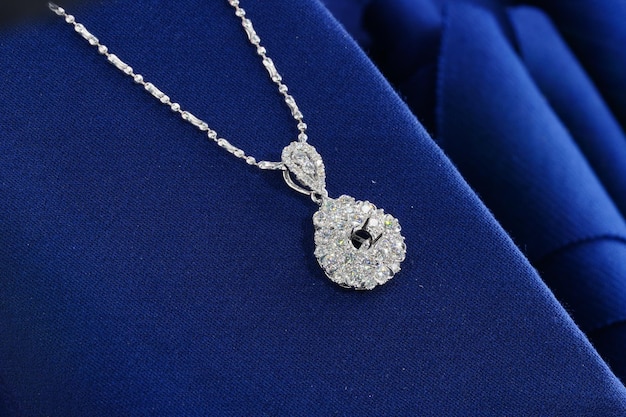 Diamonds necklace shot against a blue background