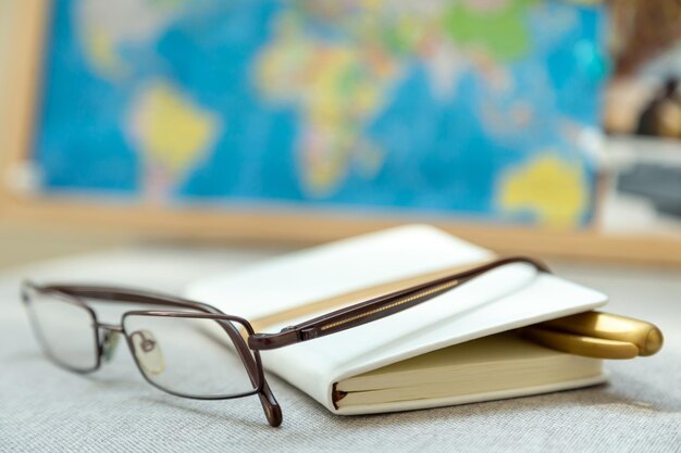 Diary journal and reading glasses old-fashioned way to write to do list