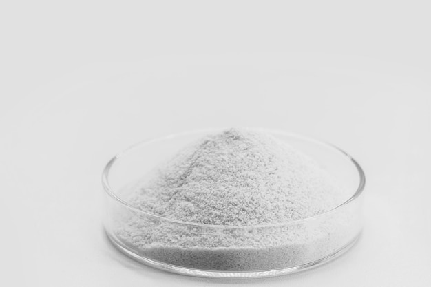 Dicalcium phosphate known as dibasic calcium or monohydrogen calcium phosphate powder or microgranules can be used in mixtures for animal feeds with the enriching effect of phosphorus