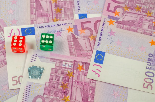 Premium Photo Dice On 500 Euro Bills premium-photo-dice-on-500-euro-bills