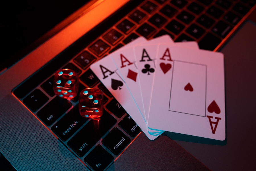 dice-and-cards-on-a-laptop-casino-online-concept_253401-6820.jpg?w=900