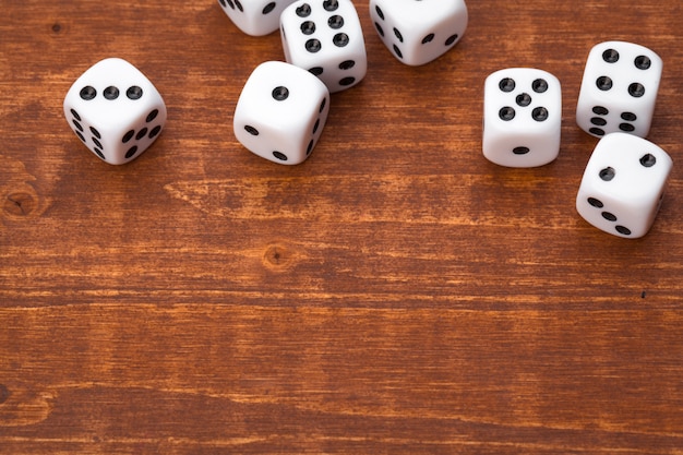 Dice on wooden table. for casino games.