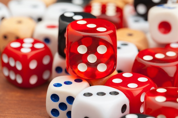 Dice on a wooden table. Concept for business risk.