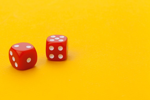 dice on a yellow background