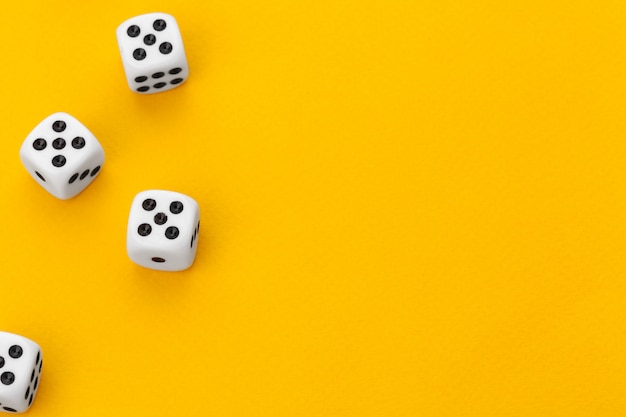 Photo dice on a yellow background