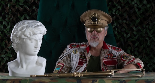 dictator at a military table