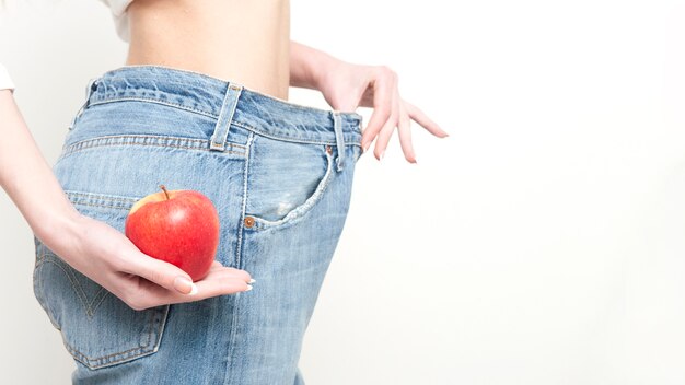 Diet concept and weight loss Woman In Oversize jeans