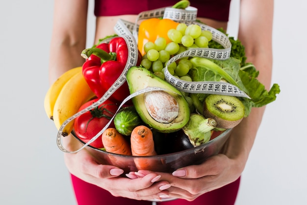 Foto concetto di dieta con sport donna e cibo sano