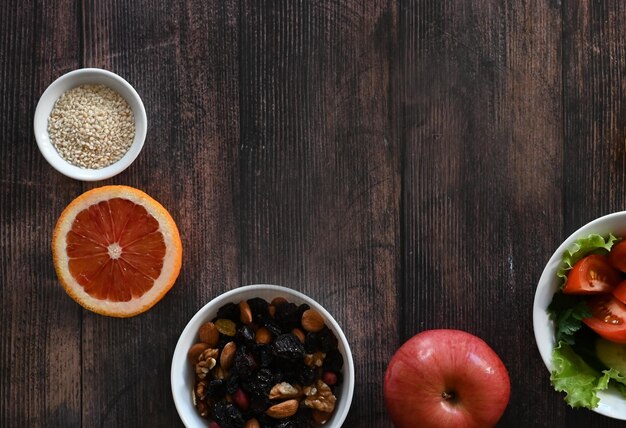 Diet health care vegetables fruits centimeter tape on a dark background