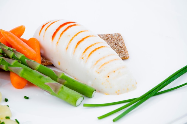 Diet meal, asparagus with carrots and sea food