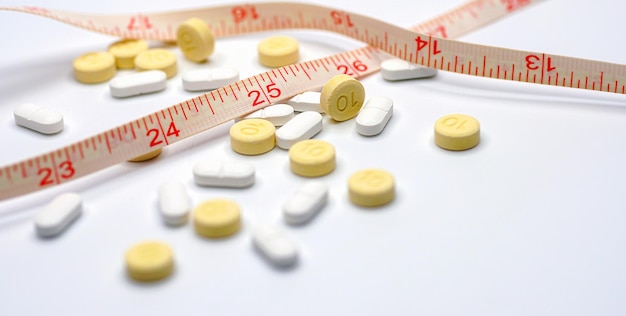 Diet pills with tape measure