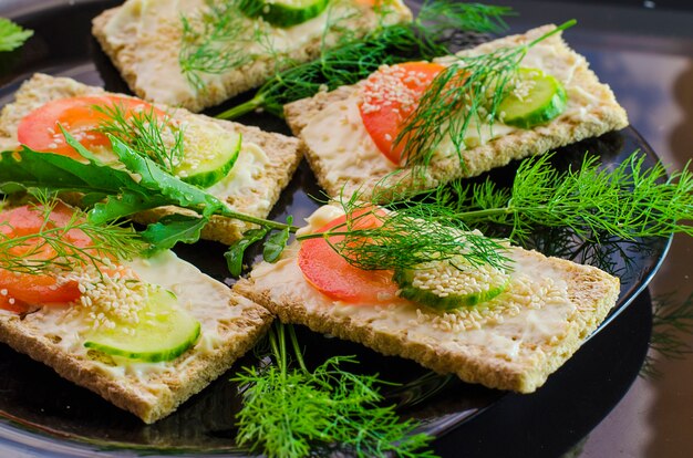 Diet sandwich with cheese and vegetables on a plate