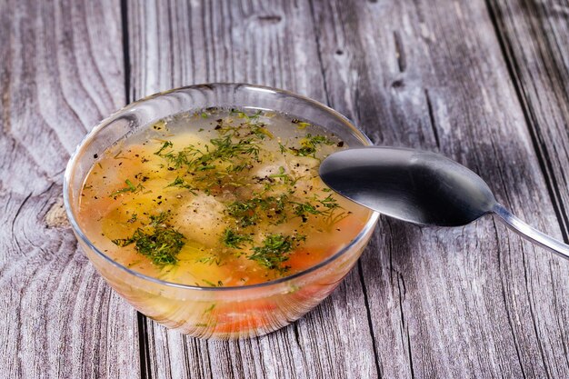 Photo diet soup on a wooden table