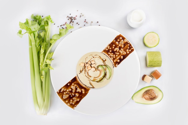 Diet soup of zucchini avocado and cheese