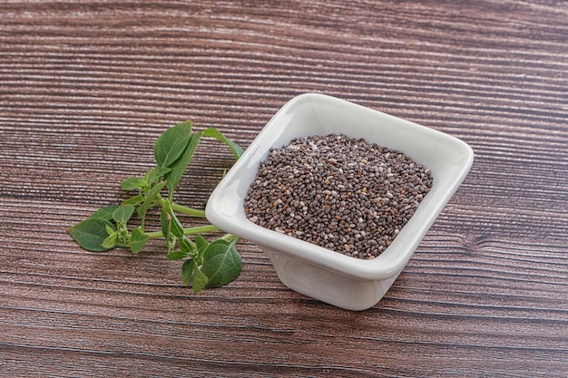 Dietary chia seeds grain in the bowl
