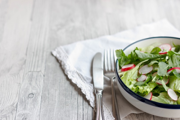 Dietary food for fitness. Radish, Lettuce and Arugula Salad