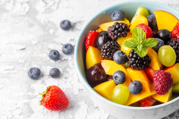 Dietary fruit salad with fresh summer fruits