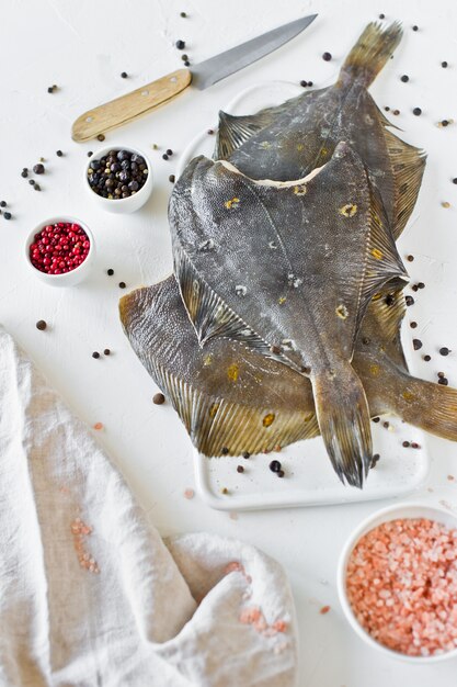 Photo dietary healthy food - flounder, ingredients for cooking.