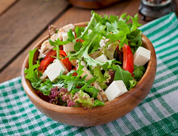 Dietary salad with chicken arugula and sweet red pepper