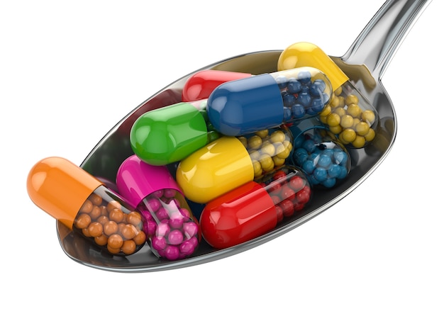 Dietary supplements. Variety pills. Vitamin capsules on the spoon. 3d