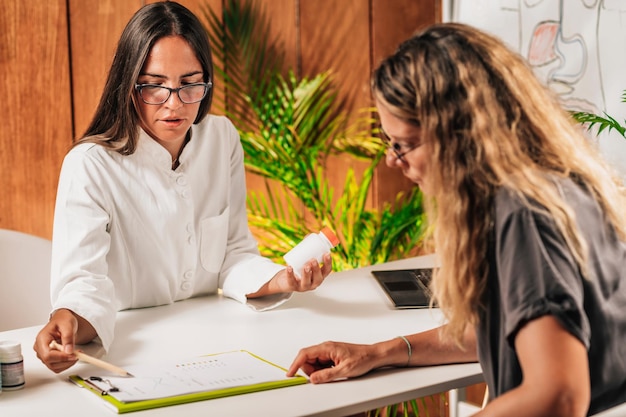 Dietitian Recommending Dietary Supplements to a Female Client