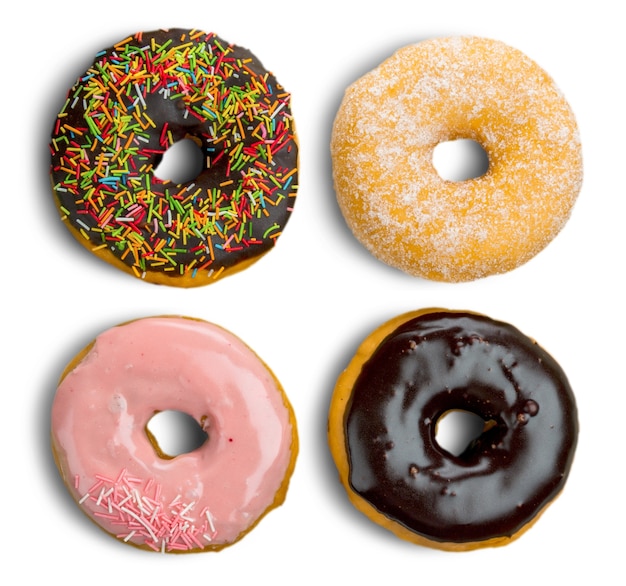 Different assorted donuts on background