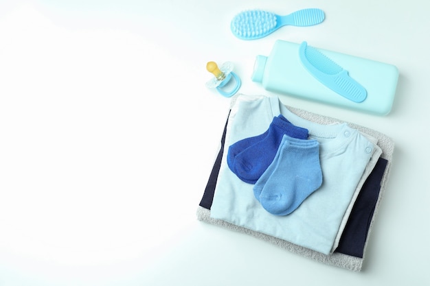 Different baby hygiene accessories on white