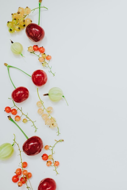 different berries on a white background
