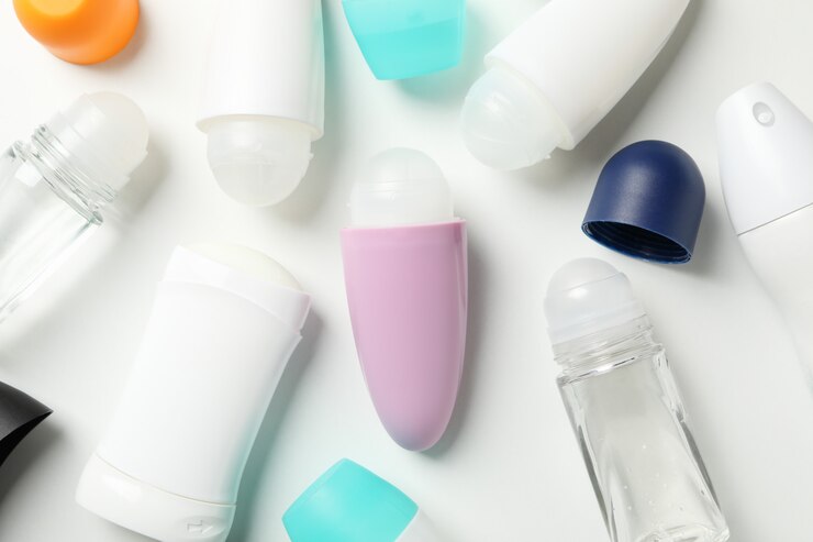 Photo different body deodorant on white background, top view