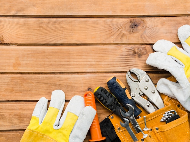 Different carpentry tools on wooden table