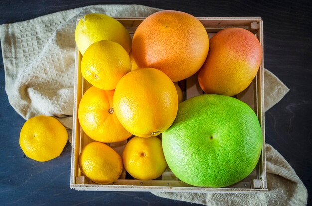 Different citrus fruits in the box