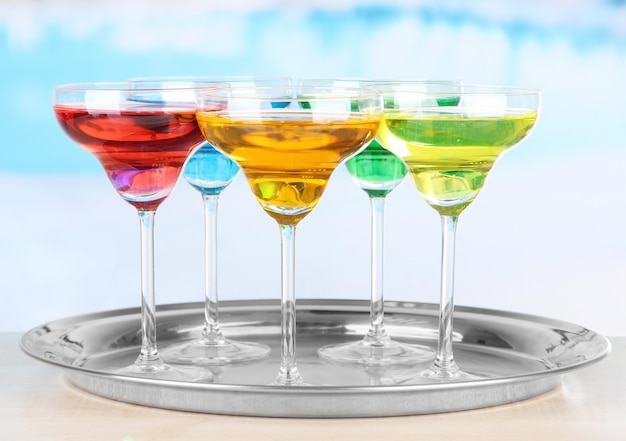 Photo different cocktails on bright background