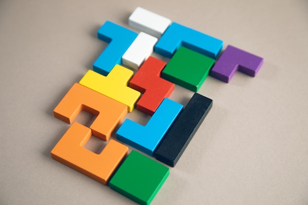 Different colorful shapes wooden blocks Geometric shapes in different colors