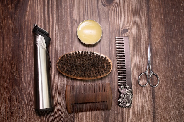 Different combs, brush and other tools for grooming a beard. Close up view.