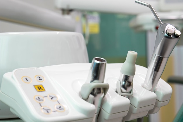 Photo different dental instruments and tools in a dentists office