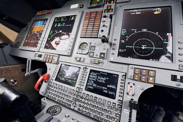 different displays close up focused view of airplane cockpit