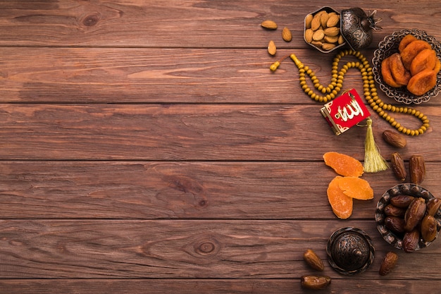 Different dried fruits and nuts with beads 