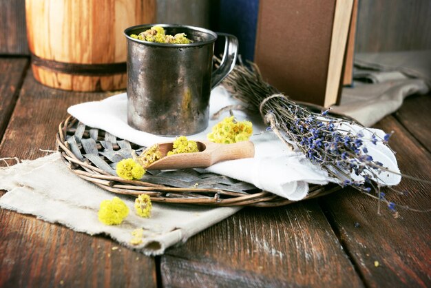 Photo different dried herbs on table close up