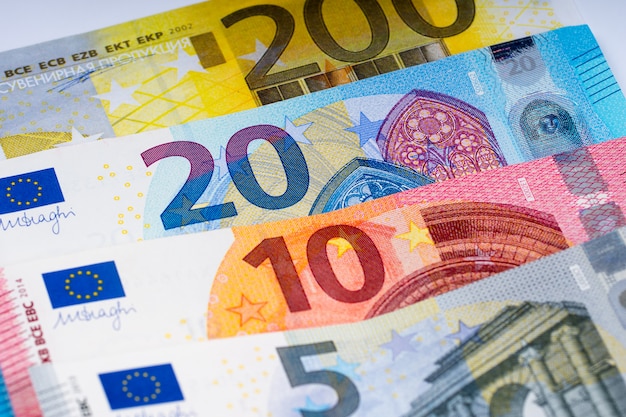 Different euro banknotes in row