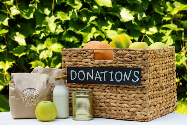 Different food with a chalk Donations sign