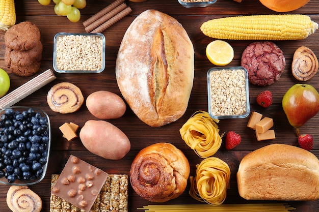 Photo different food on wooden background