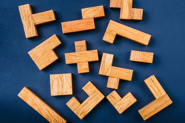 Photo different geometric shapes wooden blocks