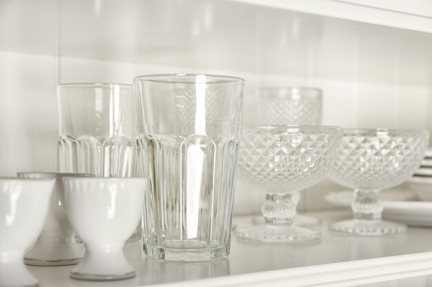 Photo different glassware on shelf